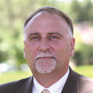 John D. Kolander headshot