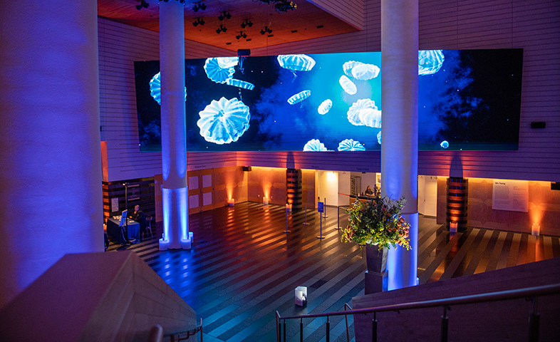 Two photos of interior of San Francisco’s Museum of Modern Art at the Celebration of Independent Higher Education