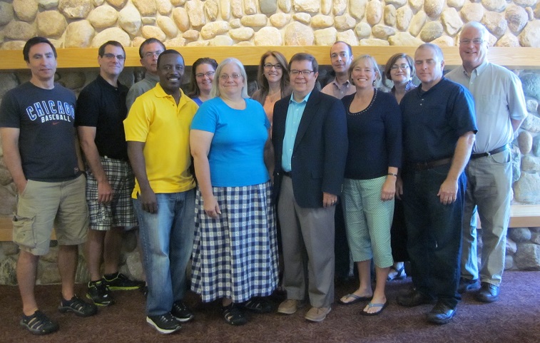 Seminar participants posing for a group photo.