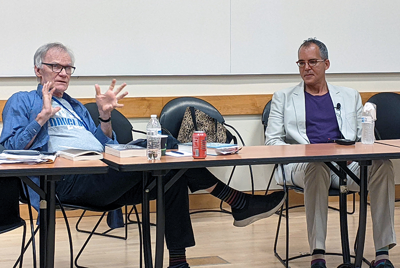 David Blight and James Forman, Jr. seated at a table