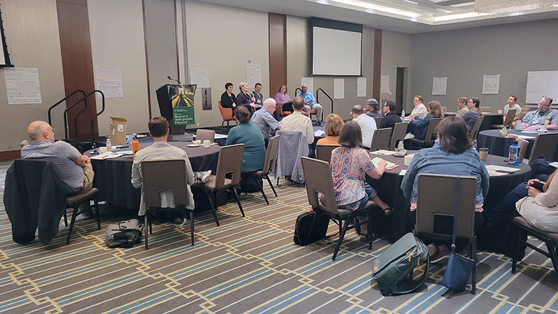 participants seated at roundtables