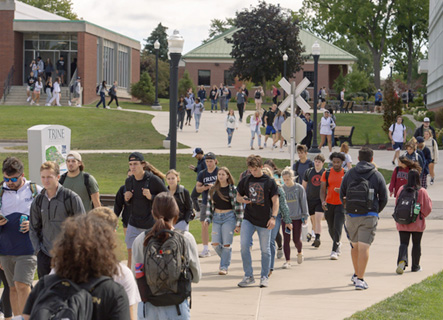 students walking through campus