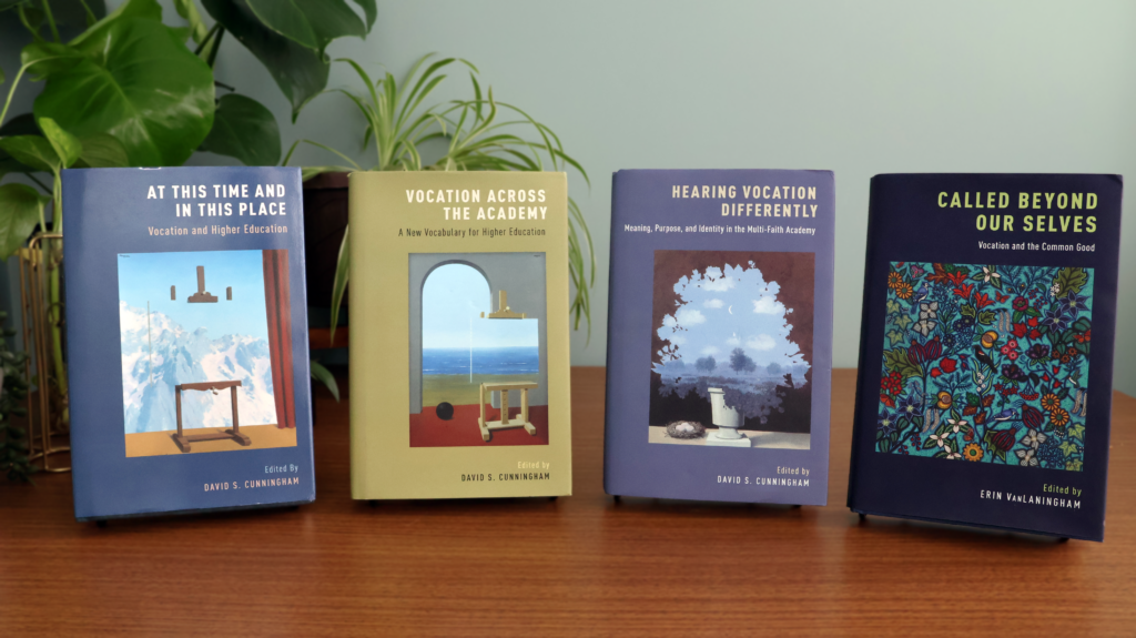 Four NetVUE books displayed across a table.