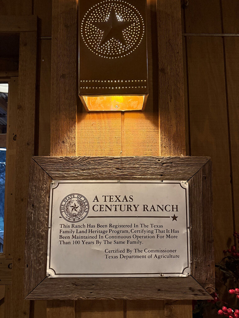 Illuminated sign: "A Texas Century Ranch"