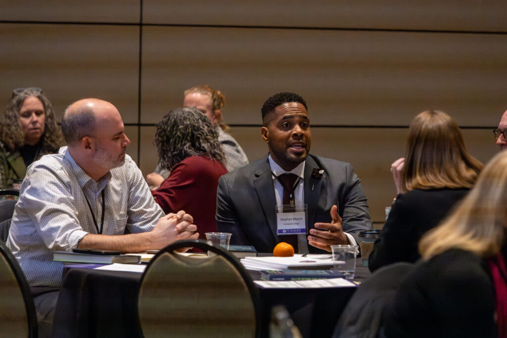Participants of the 025 NetVUE gathering at Furman University in discussion